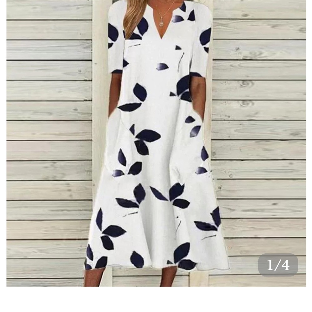 Brand new beautiful white dress with tag still on it. Never worn.